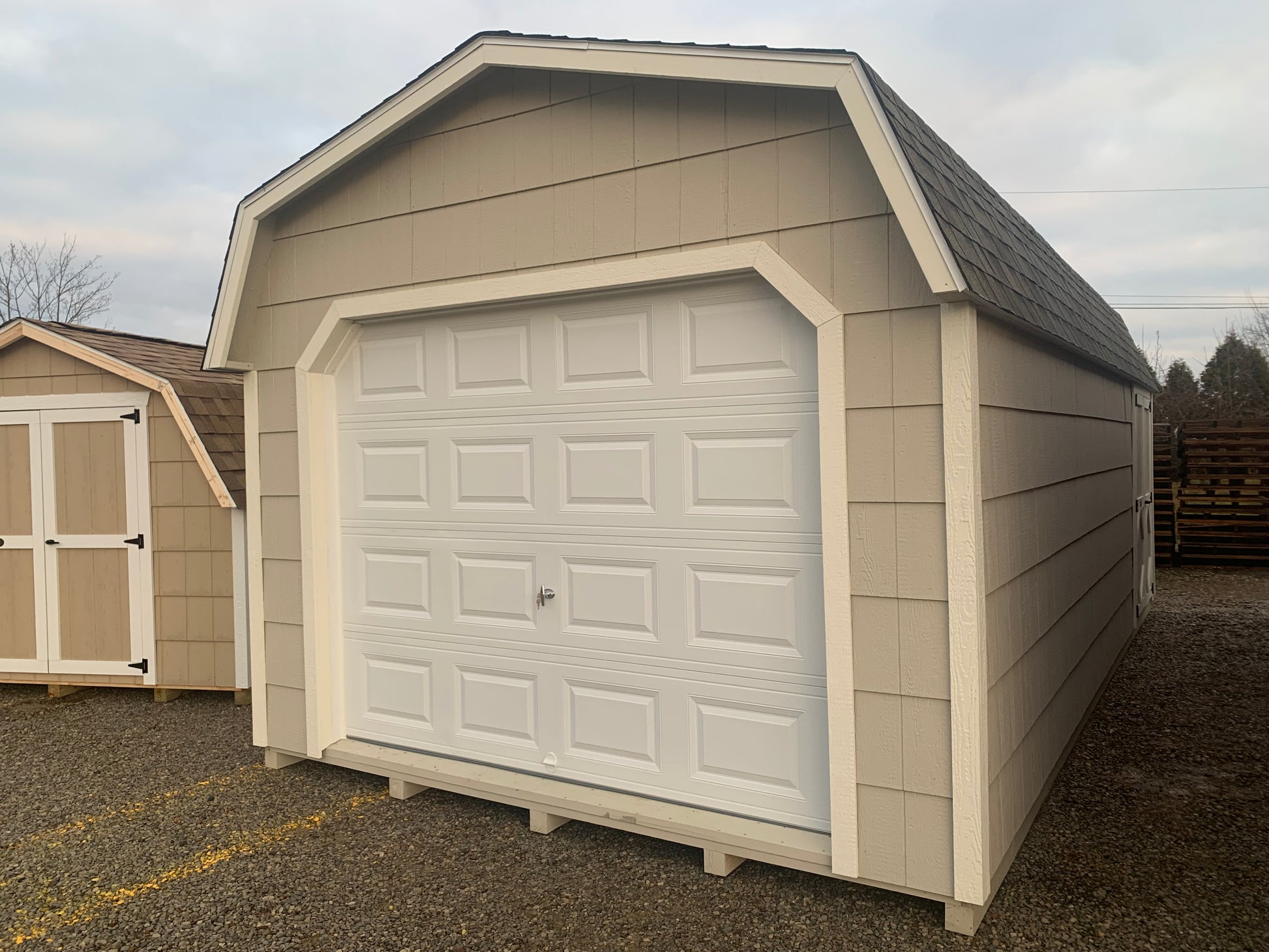12x24 Special Buy Lofted Garage with 6' sidewalls and 18" Lap Siding w/Garage Door